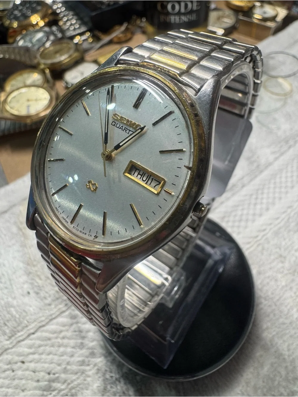 Seiko Two-Tone Silver and Gold Men's Quartz Watch with Day-Date